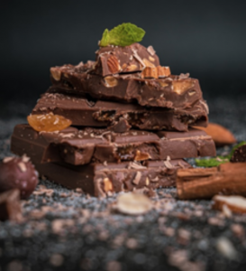 Stacked pieces of chocolate; image by Pushpak Dsilva, via Unsplash.com.