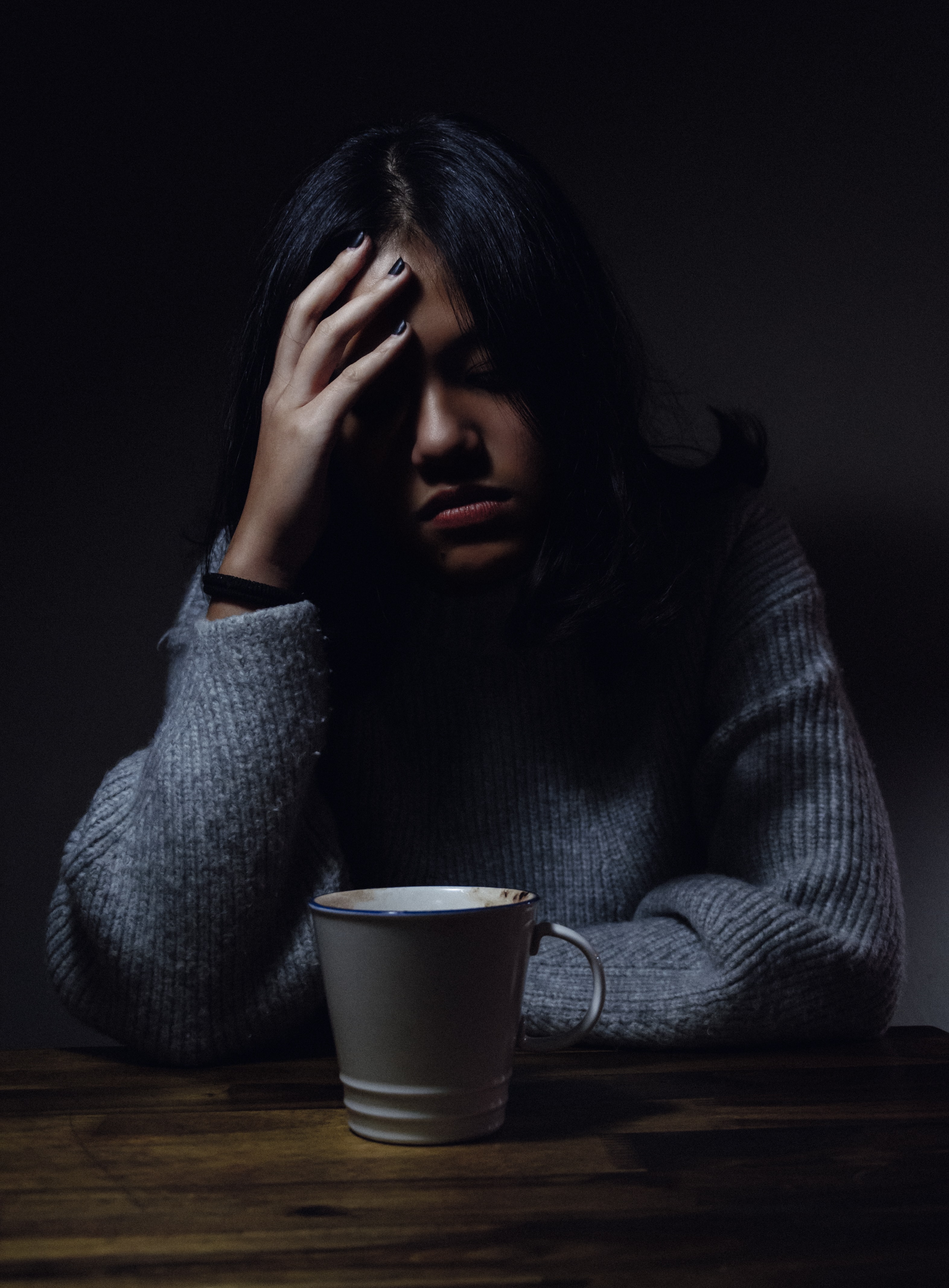 Troubled woman; image by Anh Nguyen, via Unsplash.com.